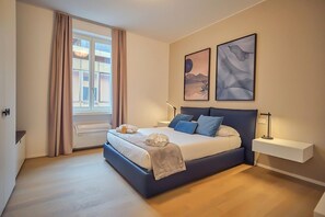 2 habitaciones, tabla de planchar con plancha, wifi y ropa de cama