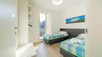 2 habitaciones, tabla de planchar con plancha, wifi y ropa de cama