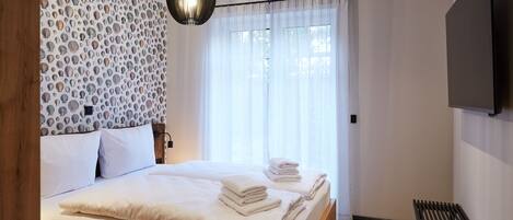 2 quartos, Wi-Fi de cortesia, roupa de cama