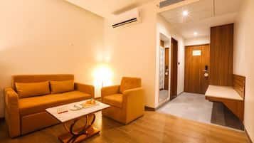 Temple View Royal Suite with Jacuzzi | Living area | 43-inch flat-screen TV with satellite channels