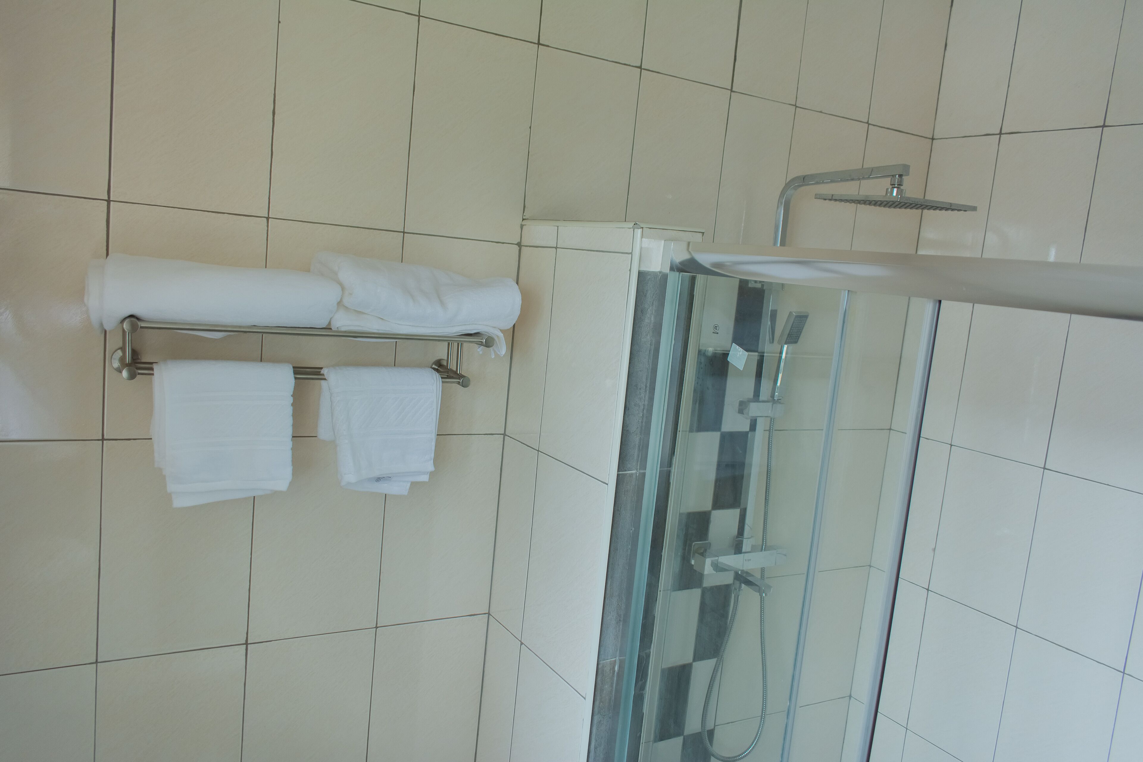 Exclusive Apartment | Bathroom | Shower, towels, soap, toilet paper