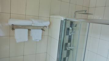 Exclusive Apartment | Bathroom | Shower, towels, soap, toilet paper