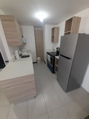 Microwave, oven, stovetop, coffee/tea maker