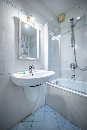 Hair dryer, bidet, soap, shampoo