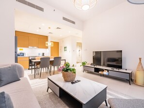 Deluxe Apartment | Living area | 55-inch LED TV with cable channels - Creek Beachfront Heaven 1BR Luxe Harbor (Dubai)