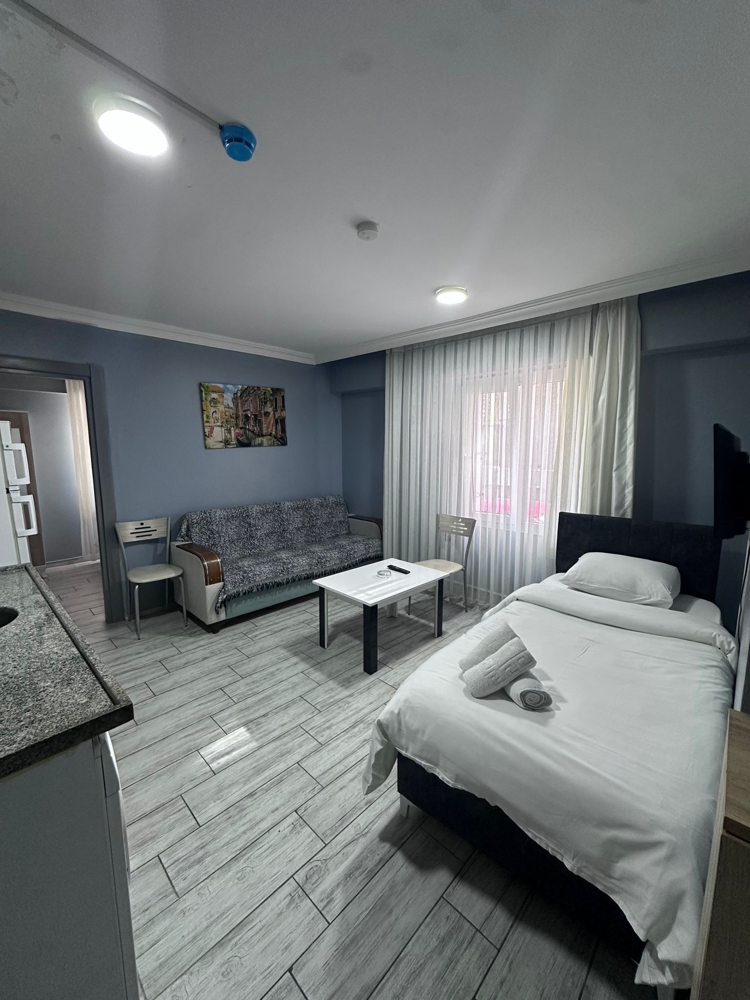 Suite familiare | Postazione laptop, tende oscuranti, ferro/asse da stiro, Wi-Fi gratuito