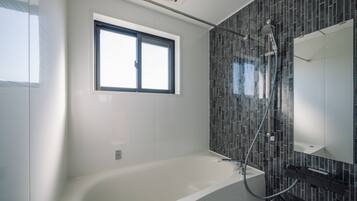 Exclusive Villa, 3 Bedrooms, Kitchen, Garden View | Bathroom | Combined shower/tub, rainfall showerhead, free toiletries, hair dryer