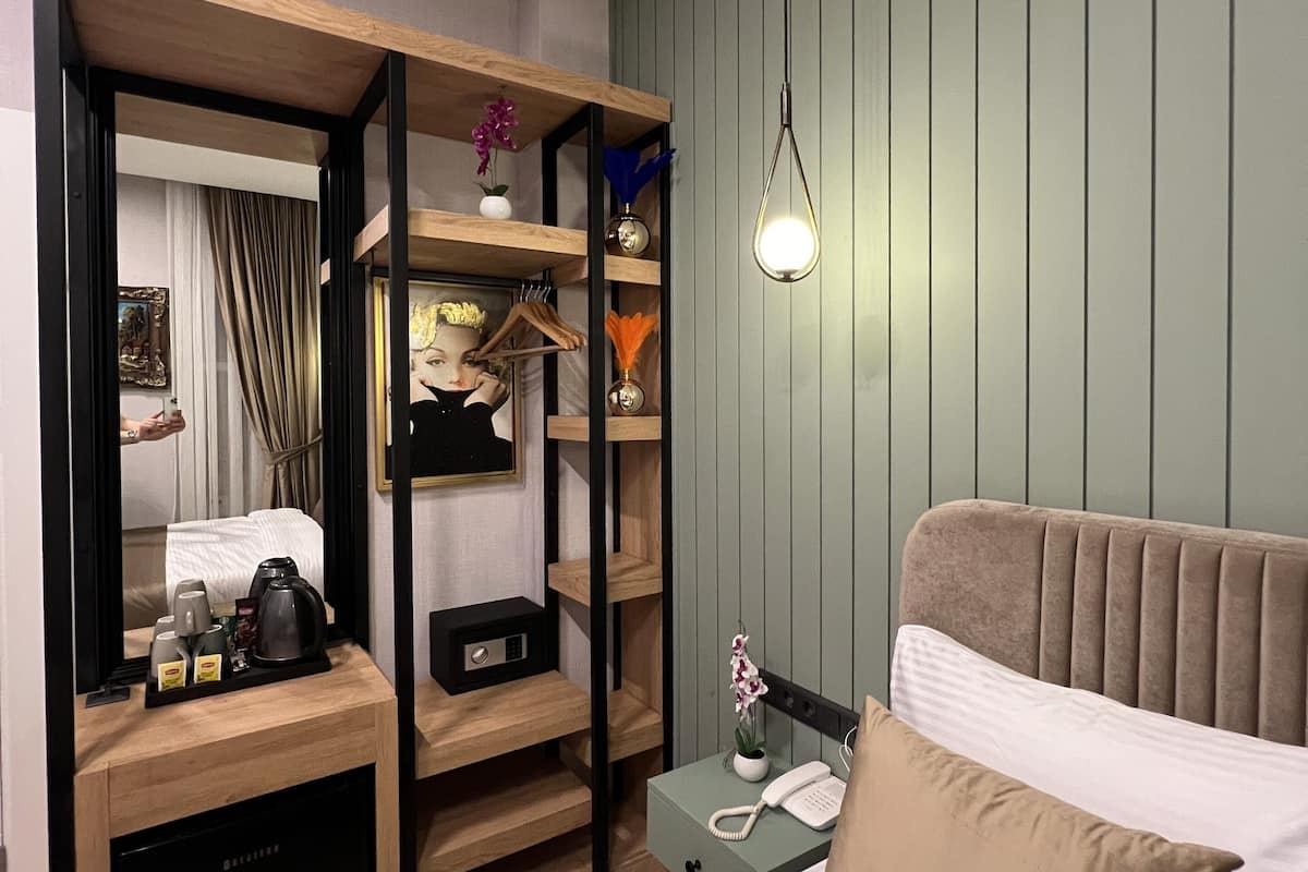 Premium bedding, down duvets, memory-foam beds, in-room safe