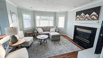 TV, fireplace, books, offices