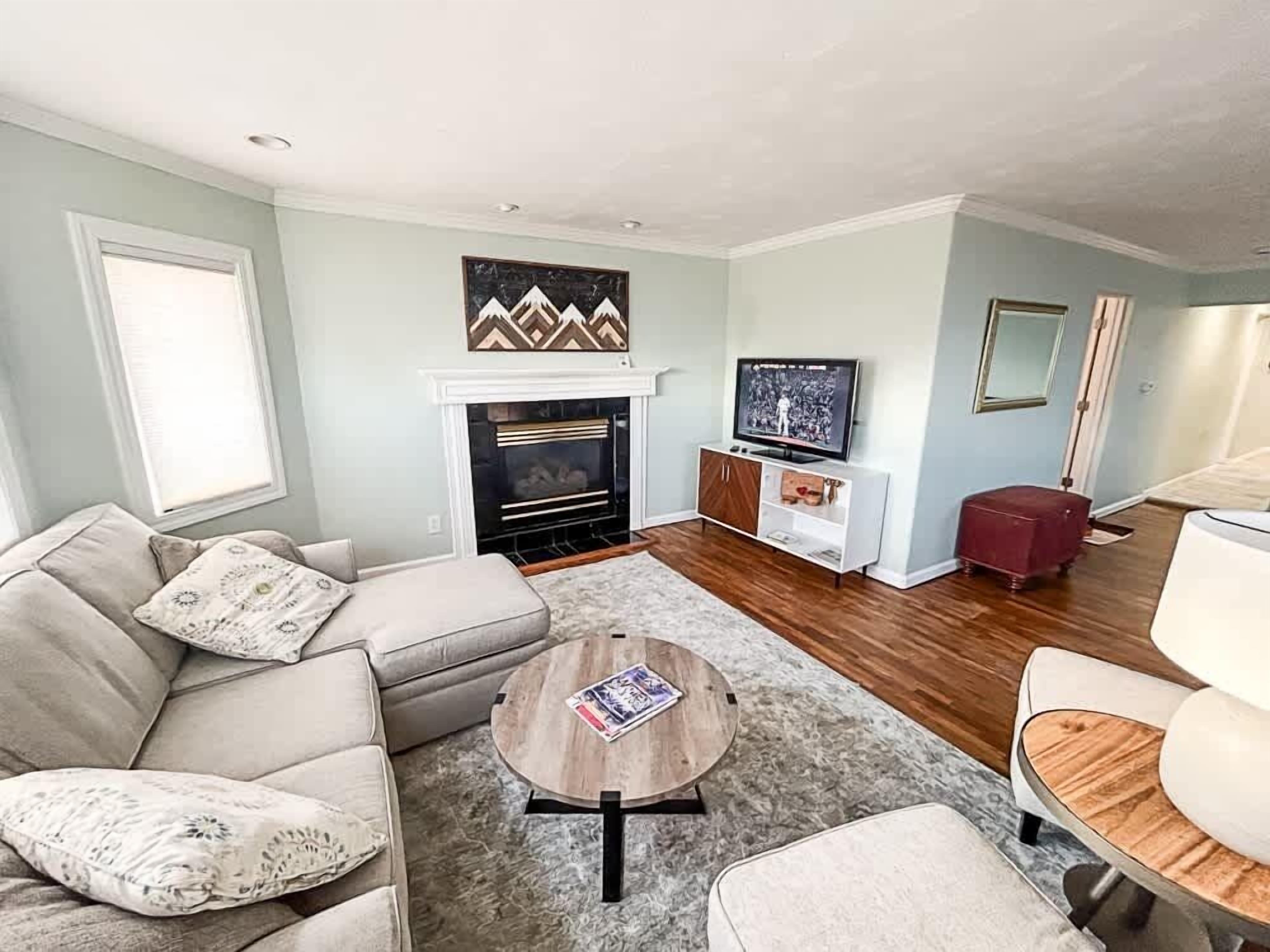 TV, fireplace, books, offices