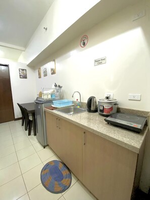 Stovetop - Comfy 1-bedroom condo unit with Smart TV and high speed Internet (Baguio)
