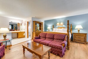 Laptop workspace, bed sheets