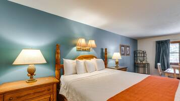 Laptop workspace, bed sheets