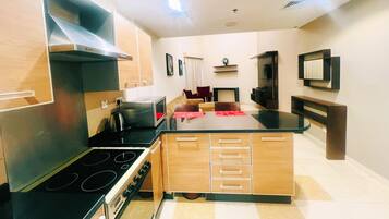 Economy Apartment, Kitchen | Living area | Flat-screen TV