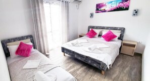 Appartement de base, Plusieurs lits, non-fumeur, cuisine | SystĂšme dâinsonorisation, fer et planche Ă repasser