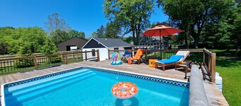 Heated pool hot tub play set screened porch sauna putting green