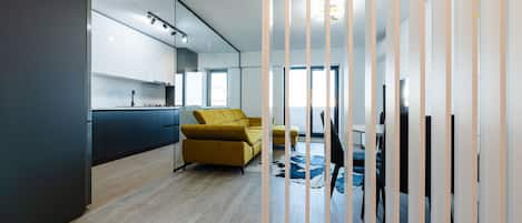 Premium Apartment | Living area | 55-cm Smart TV with cable channels, Netflix, streaming services