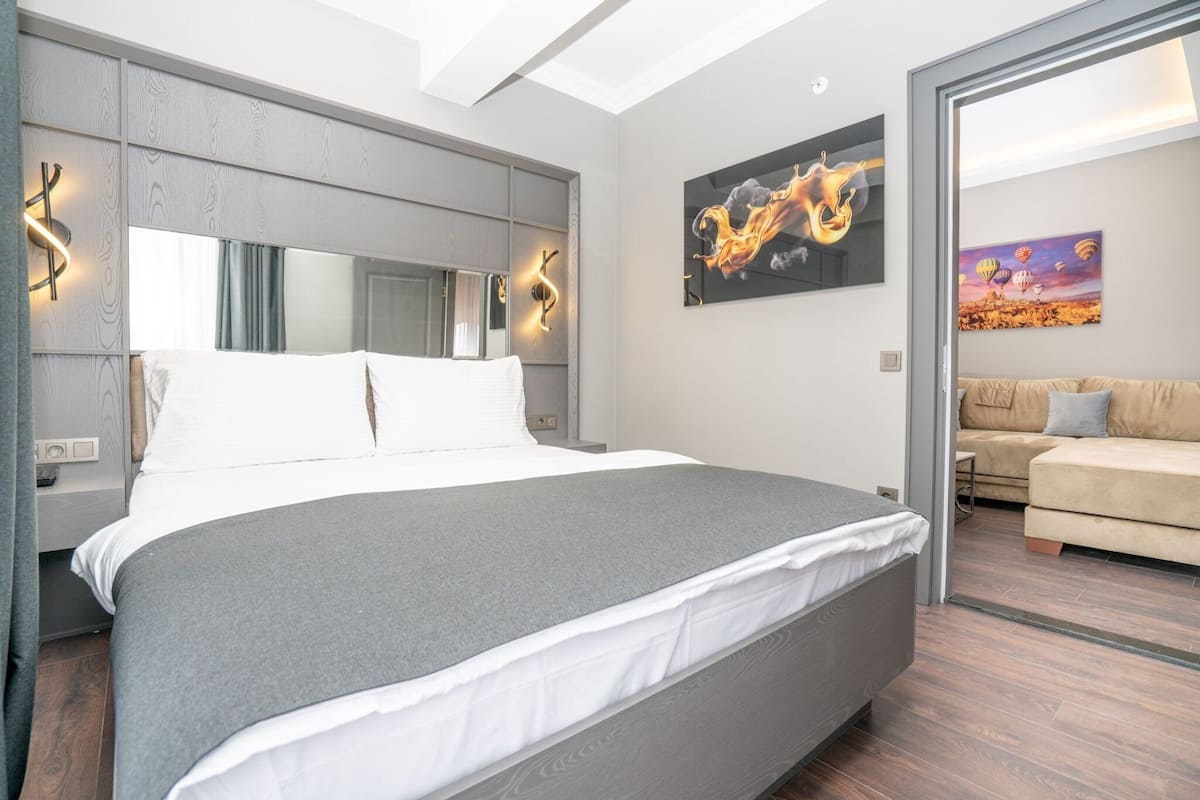 Premium bedding, desk, laptop workspace, soundproofing