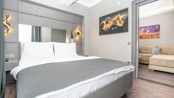Family Suite, Multiple Beds, Balcony, City View | 1 bedroom, premium bedding, individually decorated, desk