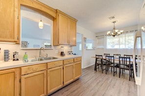 Fridge, microwave, oven, stovetop - King bed with Pool table, decked patio and, gym. (Beaumont)