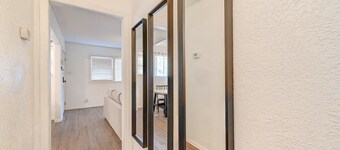 King bed with Pool table, decked patio and, gym.