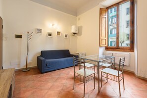 Comfort Apartment | Living area | 48-inch flat-screen TV with digital channels