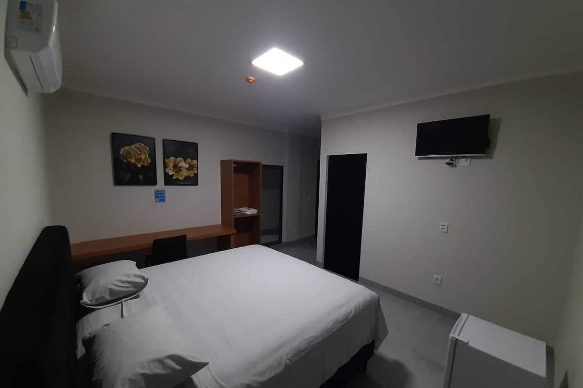 Desk, laptop workspace, free WiFi, bed sheets