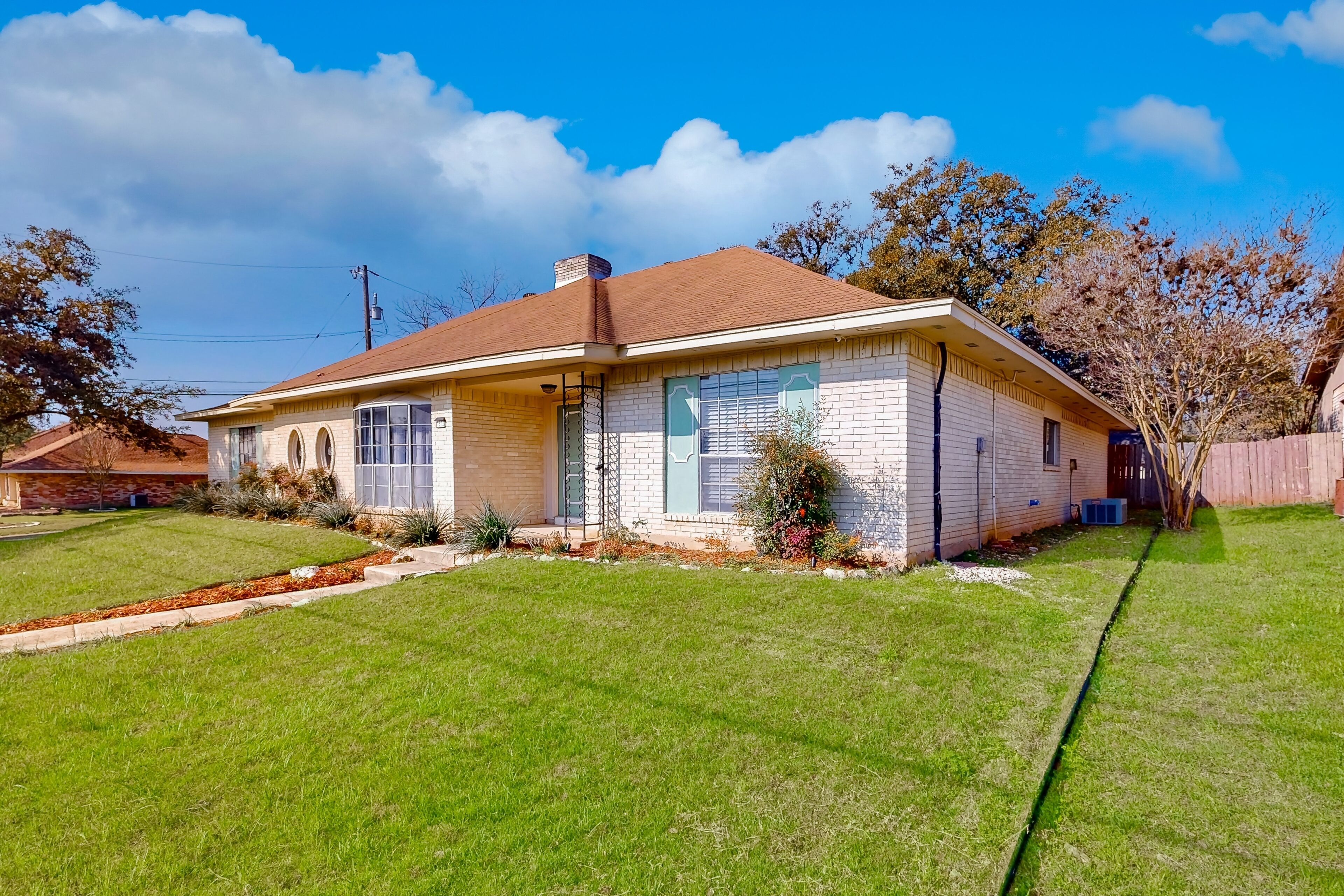 Updated dog-friendly home in great location with streaming, patio, huge backyard