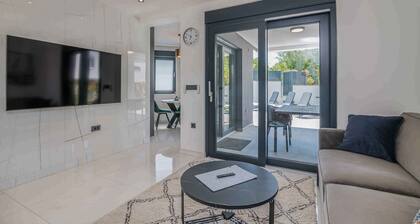 Holiday apartment with pool and air conditioning