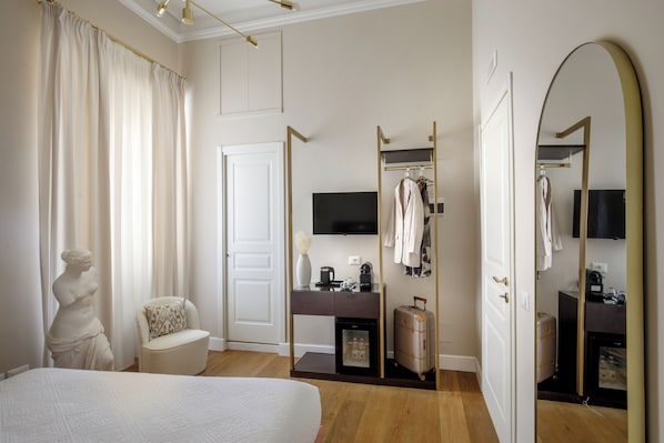 Minibar, desk, laptop workspace, iron/ironing board