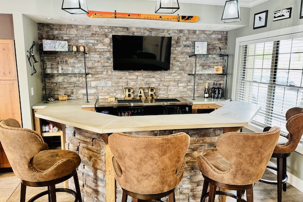 Beautifully updated bar with flat screen TV