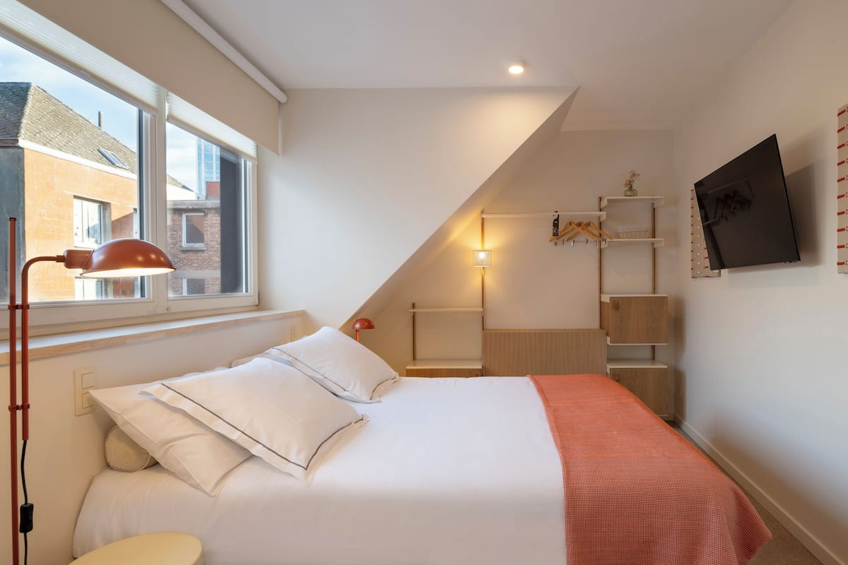 Deluxe Duplex | Select Comfort beds, in-room safe, desk, laptop workspace
