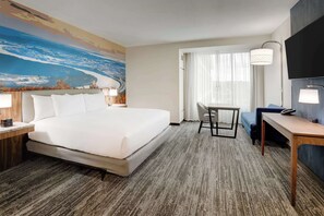 Desk, laptop workspace, iron/ironing board, free cribs/infant beds