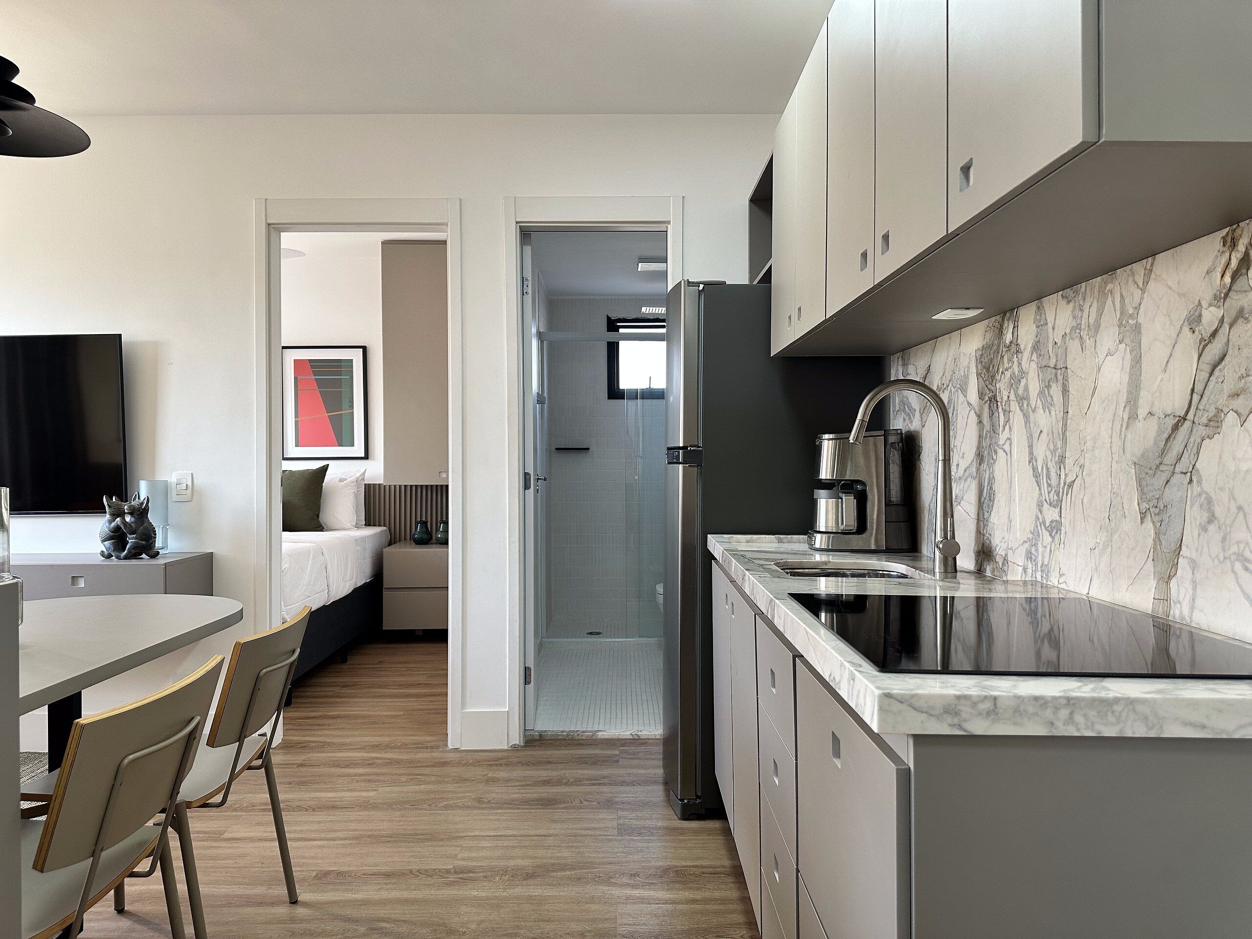 Fridge, microwave, coffee/tea maker, cookware/dishes/utensils