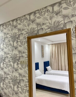 2 habitaciones, tabla de planchar con plancha y wifi gratis 