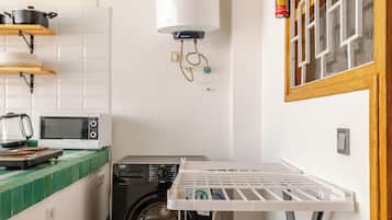 Apartamento superior, varias camas | Cocina privada | Frigorífico, horno, placa de cocina y batidora