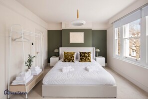 4 bedrooms, desk, iron/ironing board, travel cot