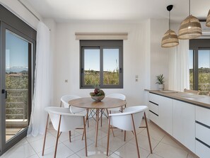 Dining - Sol Luxury Apartment: 3BD With a Rooftop Mini-Pool, 150m from the Beach (Gerani)
