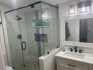 Shower, hair dryer, towels, soap