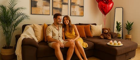 Appartement Premium | Coin séjour | TV connectée de 60 cm avec chaînes par câble, Netflix