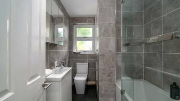 Hair dryer, towels, soap, shampoo