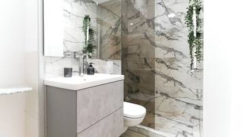 Premium Apartment | Bathroom | Shower, rainfall showerhead, hair dryer, towels