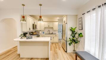 Coffee/tea maker, fridge, microwave, oven