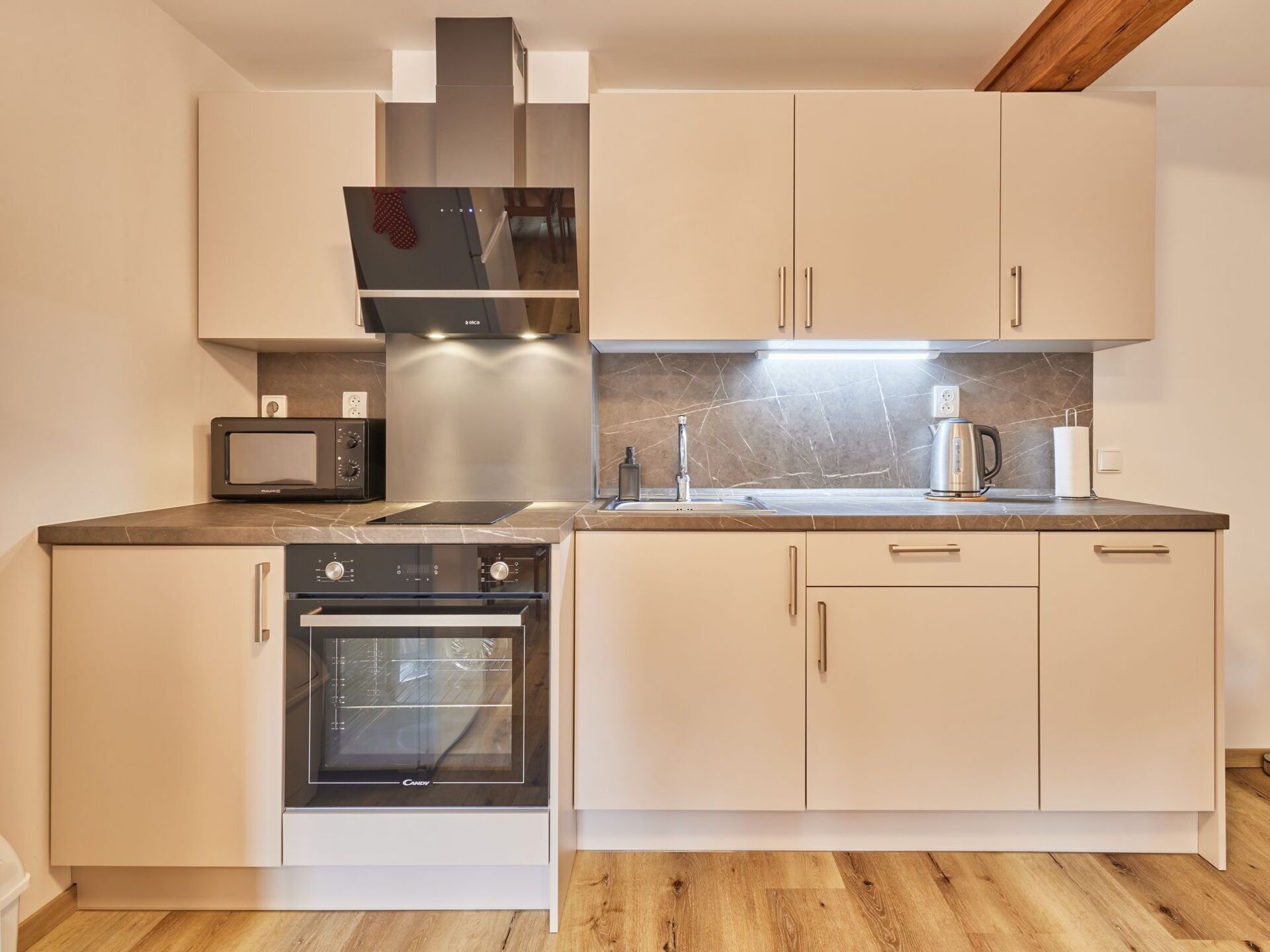 Microwave, oven, dishwasher, dining tables