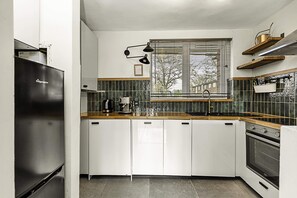 Appartamento Basic | Cucina privata | Frigorifero, forno, piano cottura, lavastoviglie