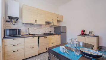 Microwave, dishwasher, dining tables