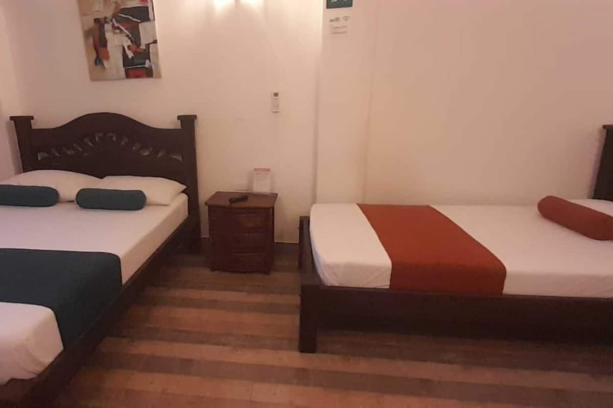 Economy Triple Room | Hypo-allergenic bedding, desk, free WiFi, bed sheets
