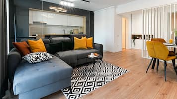 Superior Apartment, Balcony | Living area | 60-cm Smart TV with cable channels, Netflix, streaming services