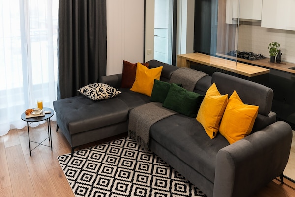 Superior Apartment, Balcony | Living area | 60-cm Smart TV with cable channels, Netflix, streaming services