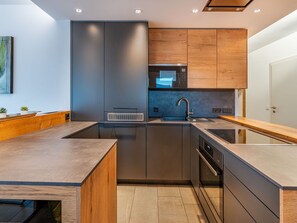 Microwave, toaster, highchair, dining tables